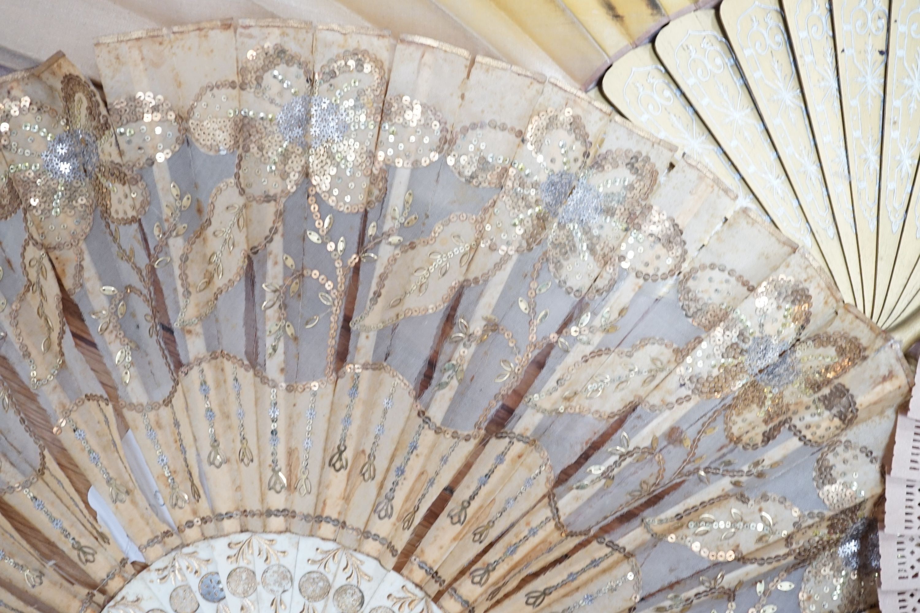 Five various fans, and an 18th century painted leaf fan with ivory chinoiserie decorated guards and sticks, 28 cms high (6)